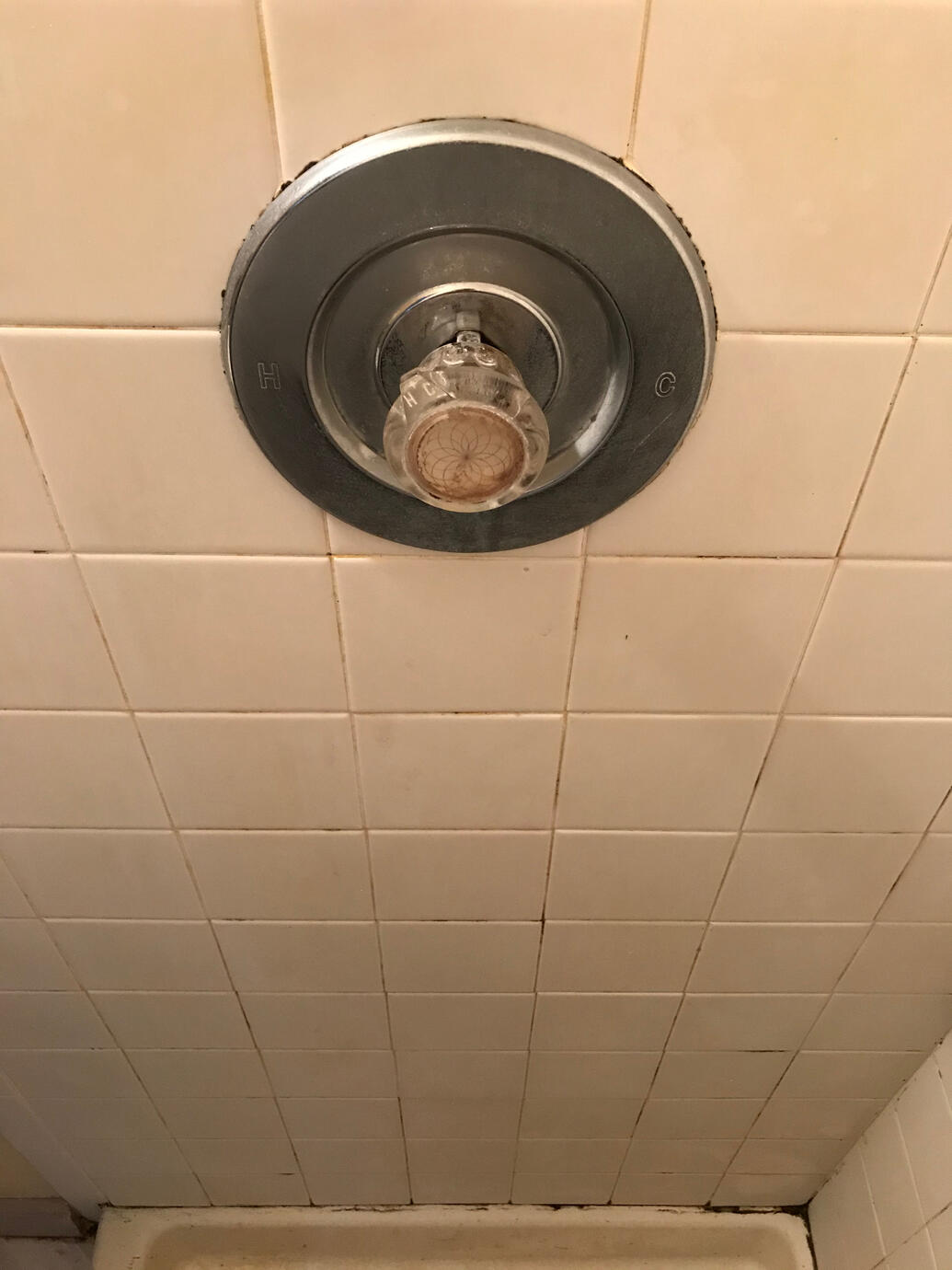 Customer had heavy soap film buildup and grimy grout lines.